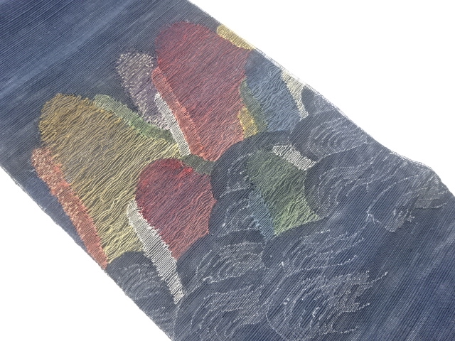 紗紬すくい織抽象波に山々模様織出し名古屋帯